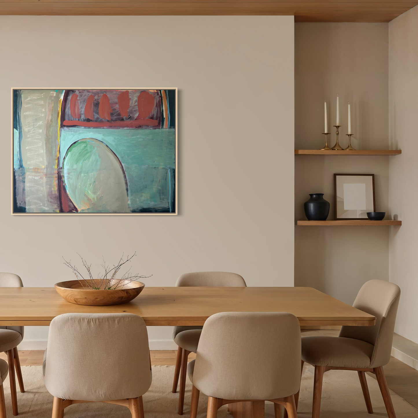 Dining room with wooden table and chairs, abstract painting on wall, and shelves with decor items.