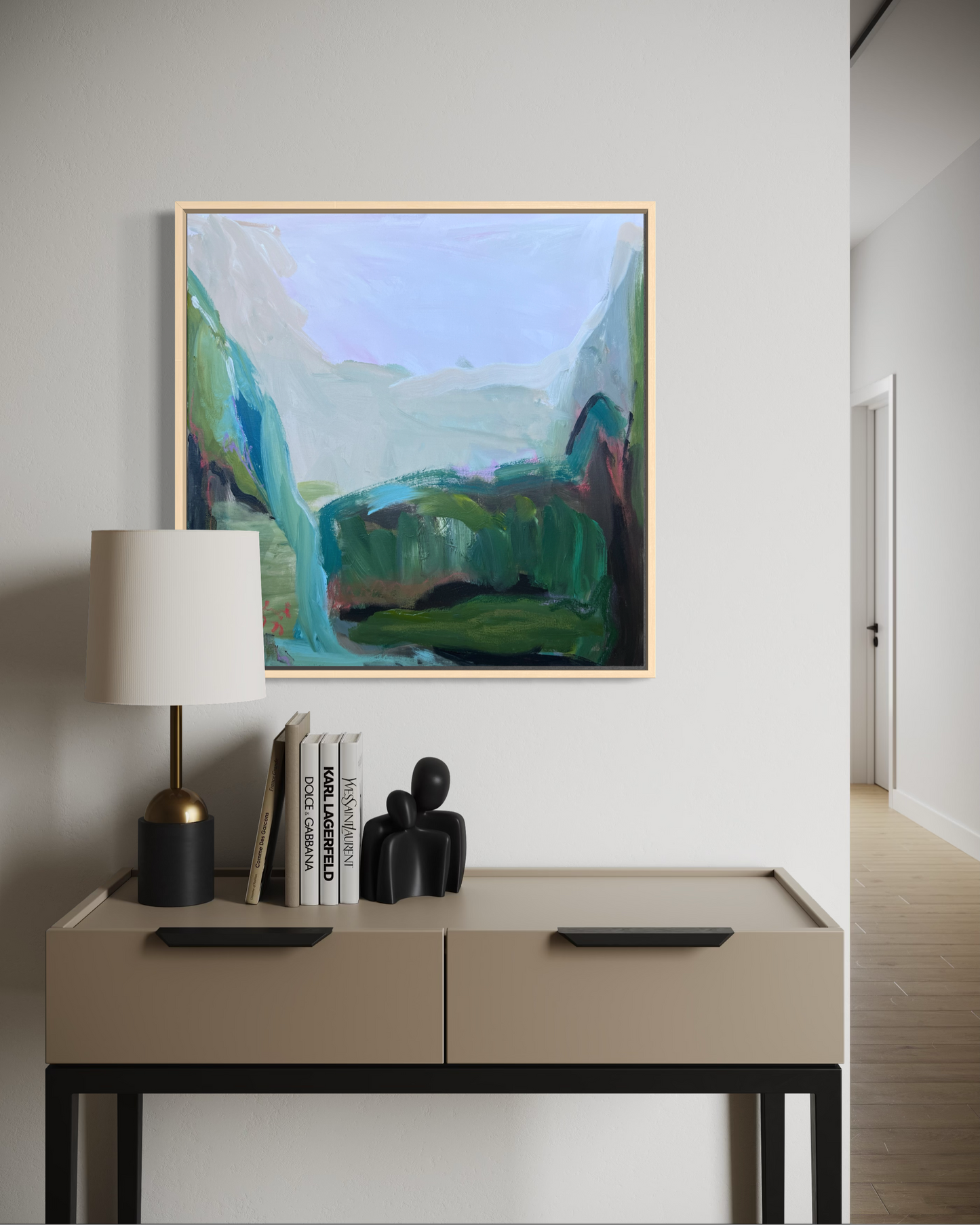 Modern interior with a side table, lamp, and abstract painting on the wall.